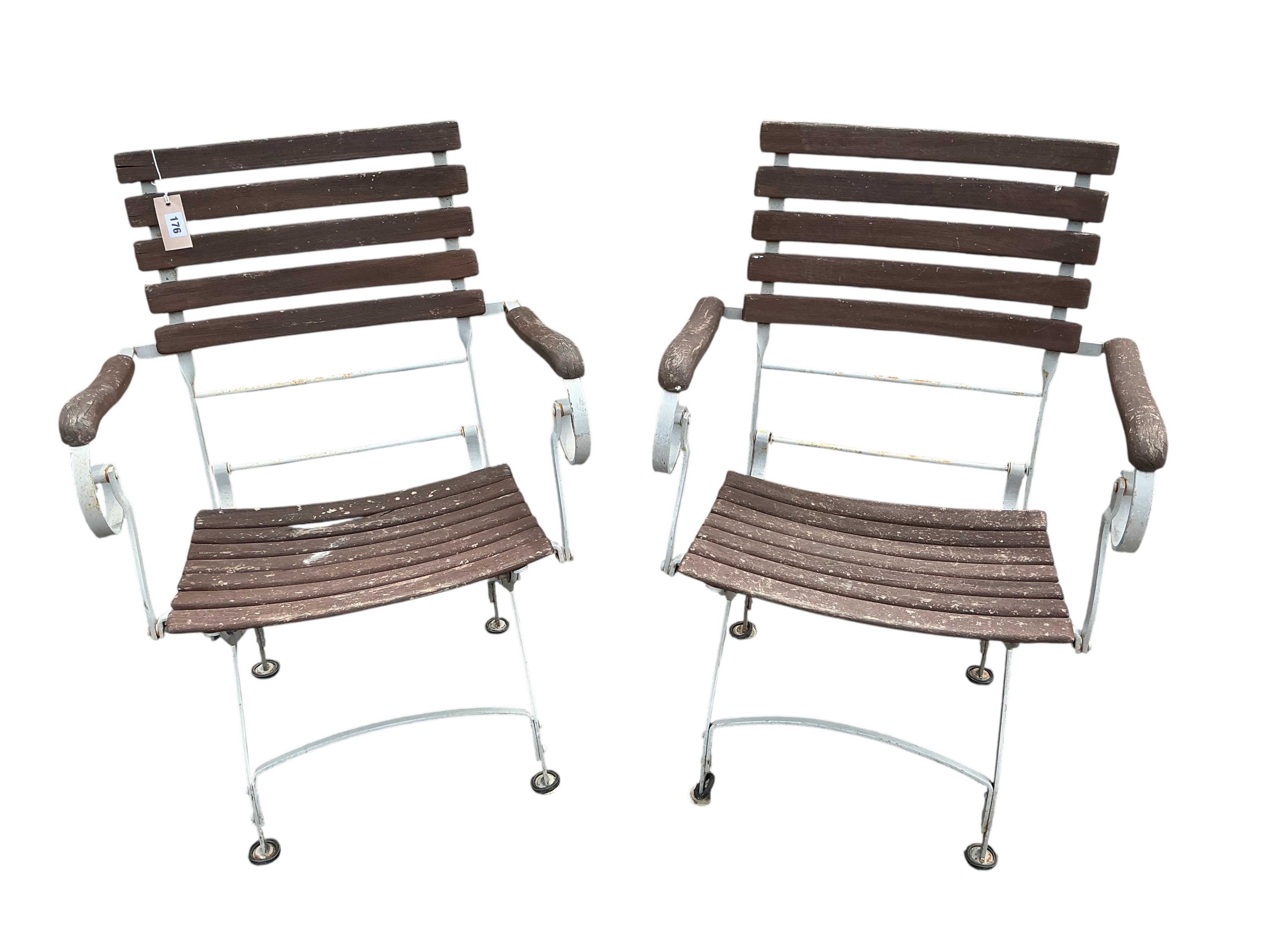 A pair of Kewdos slatted wood wrought iron folding garden elbow chairs